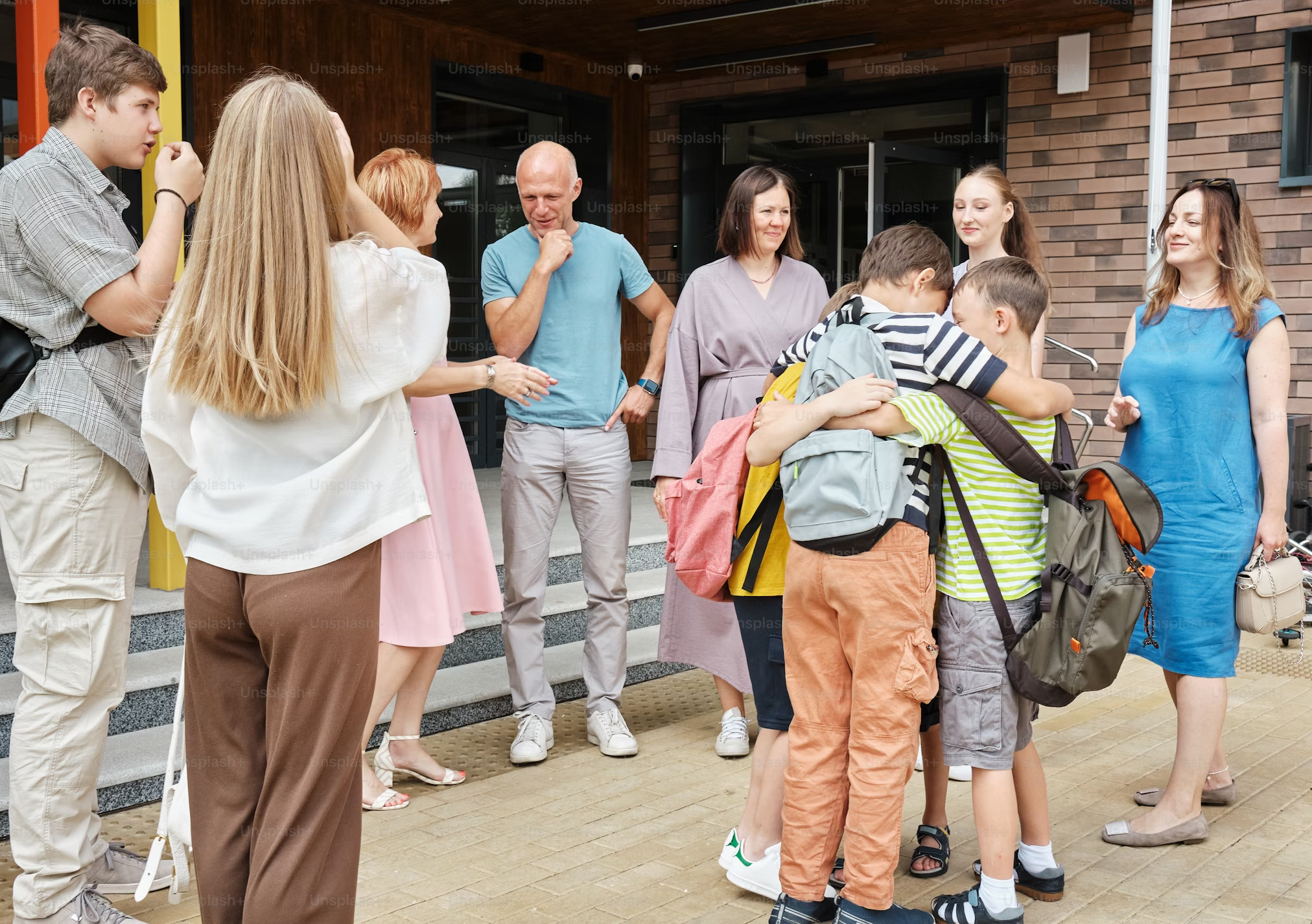 Parents and children engaging in a learning activity.